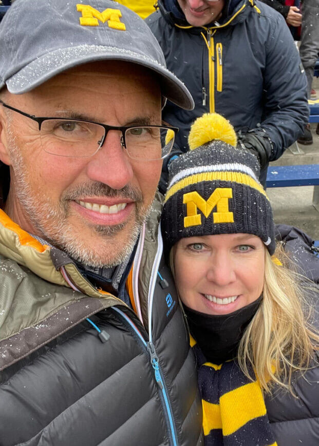 Philip and Nicole Hadley attending a U-M football game