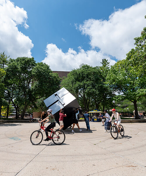 People spinning The Cube